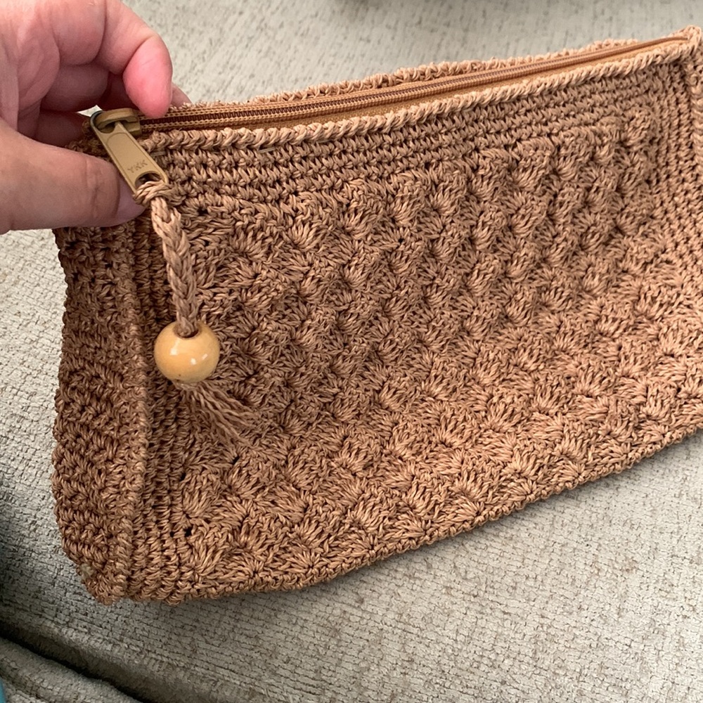 Very nice crocheted hand clutch very bohemian.